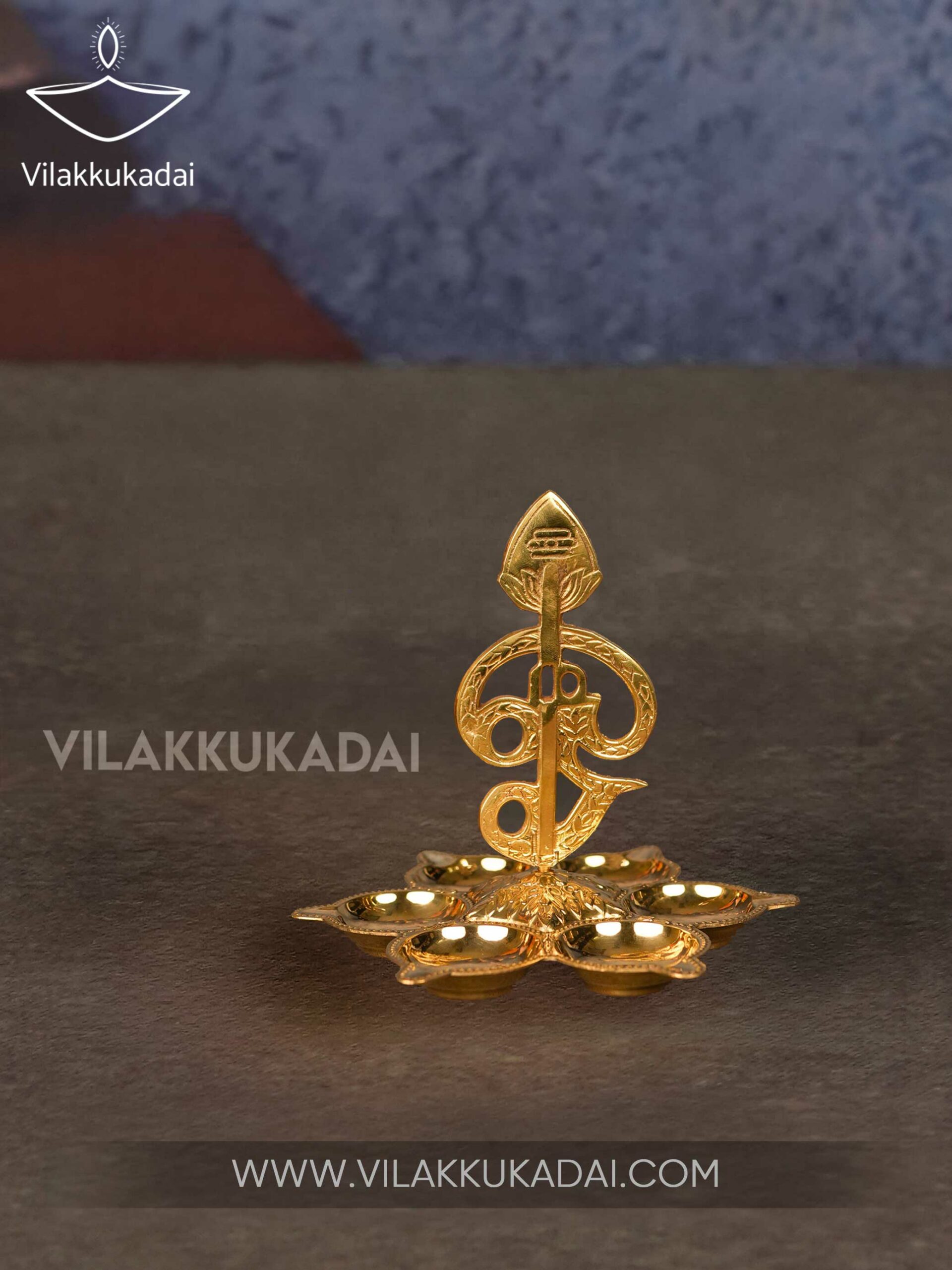 arumuga om vilakku